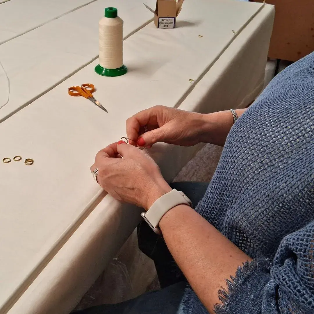 Upholstered chair in the Savery's hand upholstery workshop, Broadway