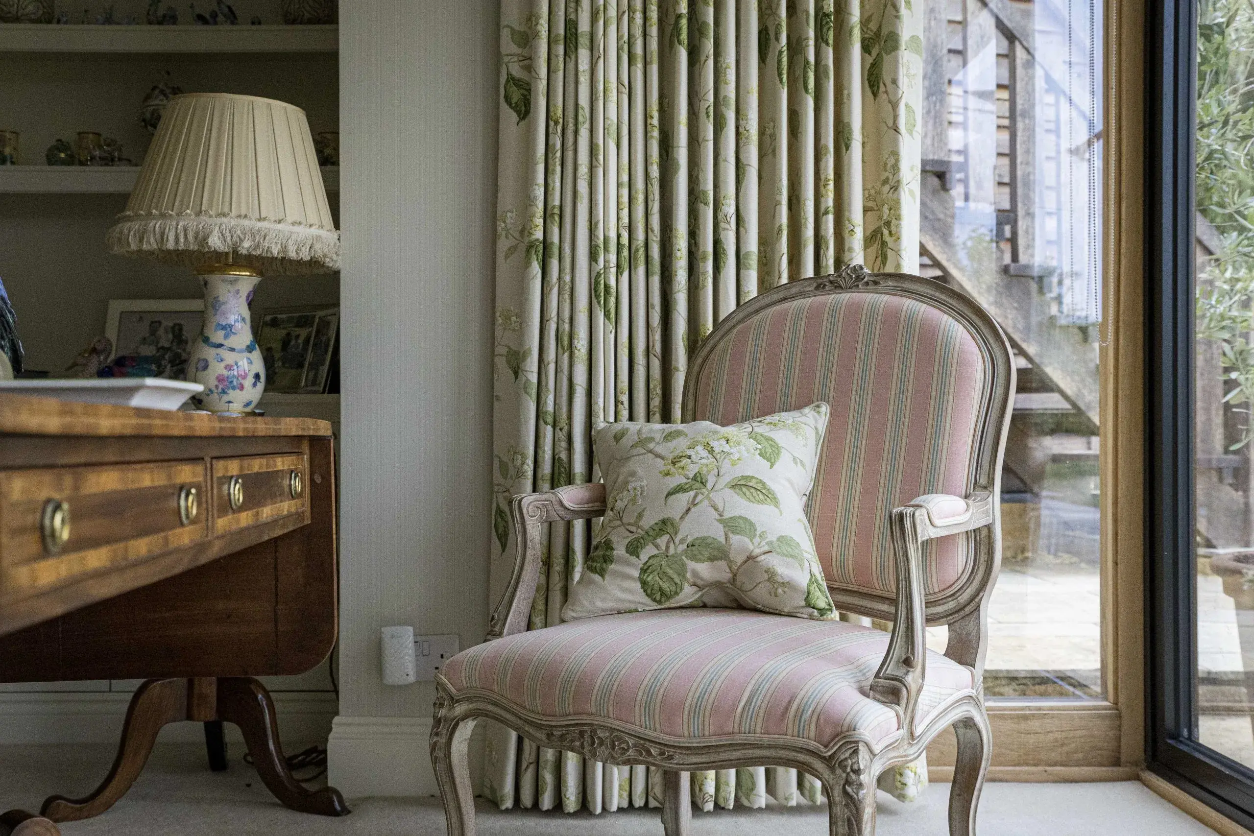 Antique chair with botanical fabric